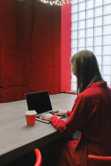 A contemporary workspace showcasing a laptop, tablet, and smartphones, ideal for tech and freelance use.