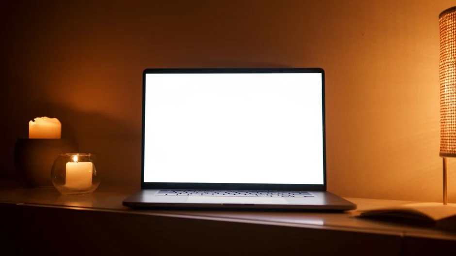 High-angle view of a stylish work desk featuring dual monitors, keyboard, mouse, and modern accessories.